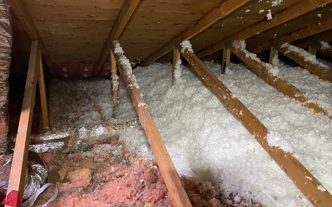 blown insulation foam in an attic