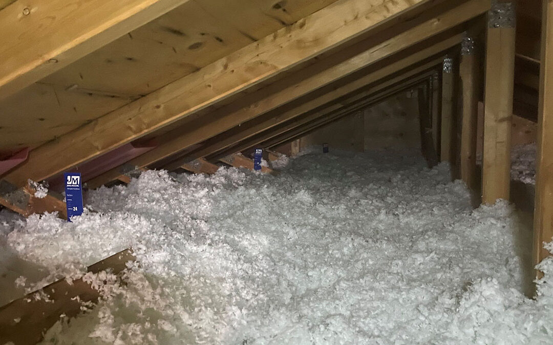 blown insulation foam in an attic